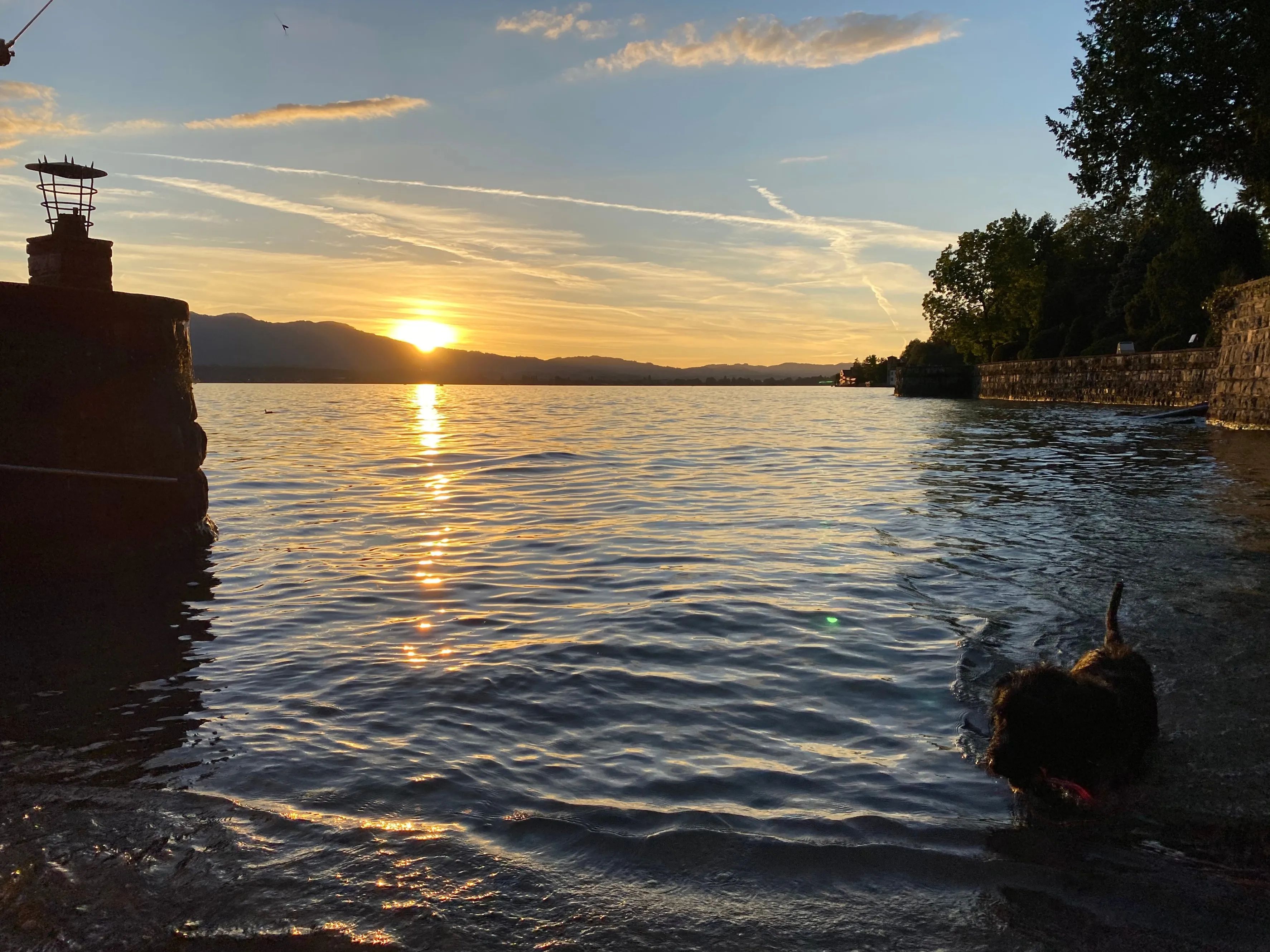 Sun over the lake of Thun at the stairs